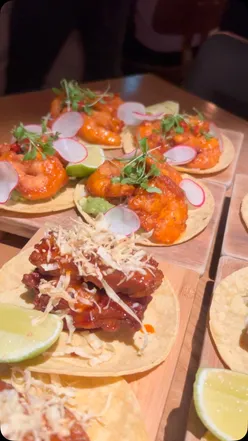 Delicious fried chicken and tiger prawn tacos with margaritas at Los Mochis, Notting Hill, London.