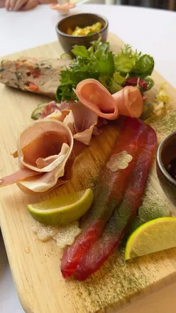 Country hotel dining at The Greenway with champagne, charcuterie, mezze platter, Angus roast beef, Yorkshire pudding, and decadent desserts.