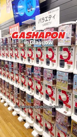 Gashapon vending machine in Glasgow City Centre at Gamersheek, surrounded by Scottish food enthusiasts and bloggers.
