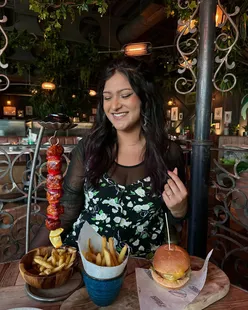 The Botanist Sheffield: Mezze sharer, vegan cheeseburger, kofta kebab, vegan cheesecake, signature cocktail, and rhubarb mocktail.