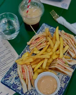 Authentic Greek food at Essence Mediterranean in Glasgow's south side, featuring club sandwich, Freddo espresso, and desserts.