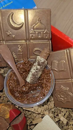 Epic Ramadan Selection Box by @choc_o_fix with 11 treats: milk chocolate moon, pistachio kunafeh dome, rocky road bar, and more.