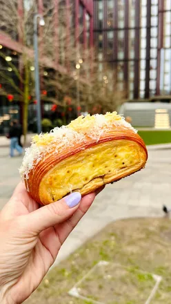Delicious truffled mac and cheese in crispy pastry from Half Dozen Other, a must-try treat in Manchester.