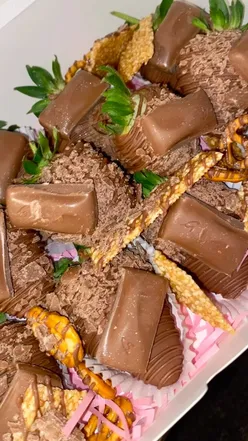 Chocolate-covered strawberry treat box from Strawbella, perfect for indulging in sweet delights.