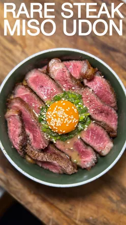 Rare sirloin steak with Sichuan peppercorns, miso butter udon noodles, and white negronis for a solo date night.