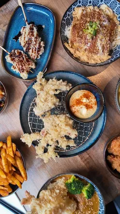 Delicious soft-shelled crab tempura and Japanese dishes at Satoru, a cozy Edinburgh restaurant.