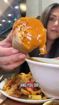 Irish chicken curry spring rolls in Sydney, filled with chicken curry and rice, served with McDonnells curry sauce at Misneach Festival.