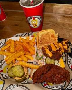 Nashville-style hot chicken tenders and jumbo sliders at Dave's Hot Chicken, Shaftesbury Avenue, London, with kale slaw and mac and cheese.