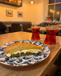 Halal Iftar menu at Oh My Flatbread featuring minced meat pide, baklava with clotted cream, and Turkish tea in Edinburgh.