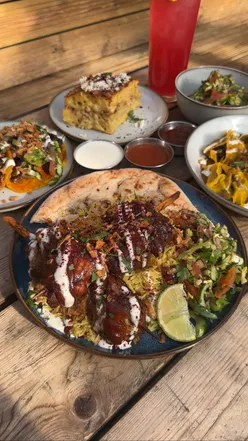 Delicious Jurkish kebab and curry goat manti showcasing Jamaican and Turkish fusion flavors at Jumbi, Peckham.
