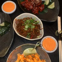 Fine dining at The Ivy Asia Cardiff: prawn toast, popcorn shrimp, gochujang chicken, sake barrel brûlée, passionfruit doughnuts.