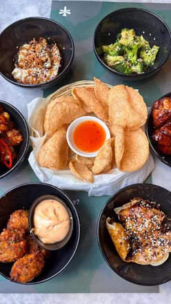 Bottomless bowls at Banana Tree: chicken dumplings, BBQ wings, sweetcorn fritters, and refreshing cocktails.