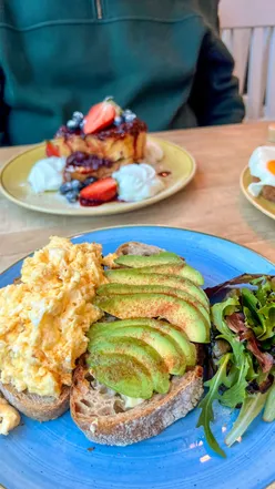 Delicious brunch dishes from @alexsbakery, including French toast, shakshuka, and avocado toast in Manchester.