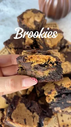 Close-up of mini egg brookies, a mix of brownies and cookies, topped with colorful mini eggs, perfect for dessert lovers.