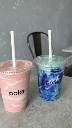 Two vibrant smoothie bowls: Glow Getter with banana, strawberries, avocado; Blue Cloud with pineapple, blue spirulina.