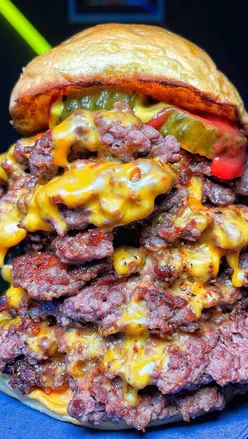 Delicious cheese and bacon burger on a plate, celebrating a decade of life changes and burger love.