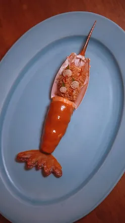 Exquisite dishes at Baan Tepa, a Michelin-starred restaurant in Bangkok, showcasing sustainable Thai cuisine.