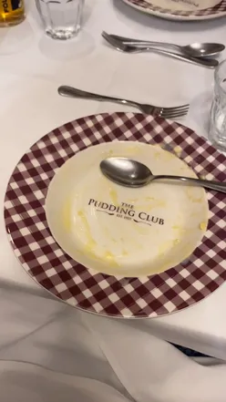Enjoying a feast of 7 traditional puddings at The Pudding Club with Buck's Fizz and delicious chicken dinner.