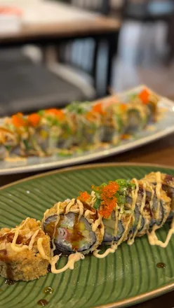 Delicious sushi platter from Ikani JI Restaurant, showcasing vibrant rolls and fresh ingredients.