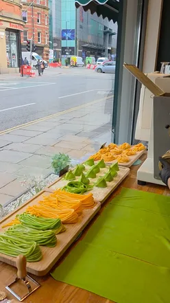 Fresh pasta being handcrafted at Italiana Fifty-Five, Manchester, showcasing culinary artistry in Deansgate and Didsbury.