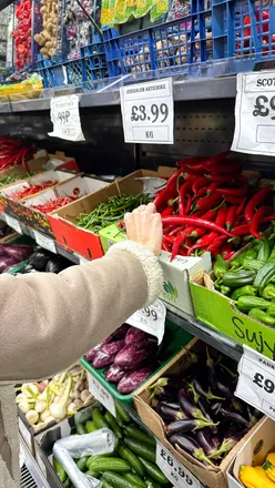 Fresh produce and Italian ingredients for beef and pork paccheri ragu at Tolian's Deli in Tooting.