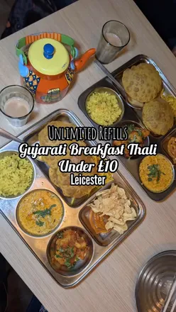 Delicious Gujarati breakfast thali with unlimited refills, featuring Ganthia, Jalebi, and Masala Chai in Leicester.