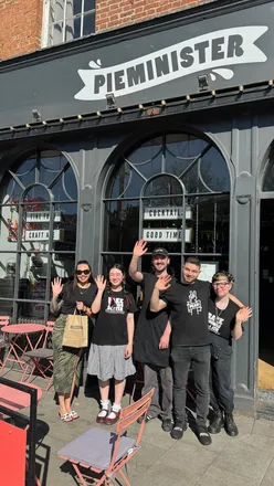 Delicious Pieminister dishes including steak & ale pie, halloumi chips, and toffee apple crumble in Bristol.