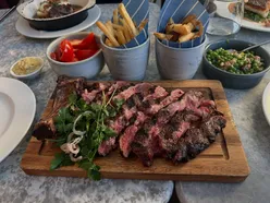 22Oz rare Cote de Boeuf with truffle fries, buttered peas with bacon, tomato basil salad at Cote UK Bristol; dessert French Brest.