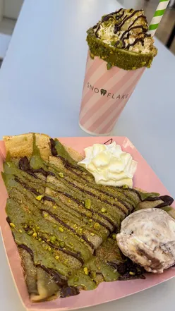 Indulge in Snowflake Gelato's Dubai Range: chocolate gelato stick, crepe, and sundae shake with pistachio.