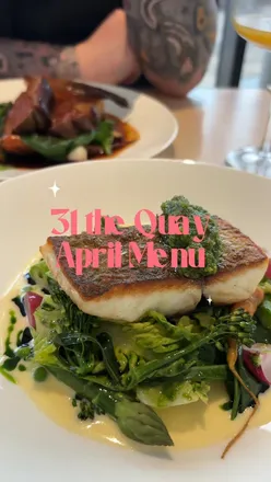 Anniversary dinner at 31 The Quay featuring strawberry margarita, focaccia, stonebass, lamb, and desserts.