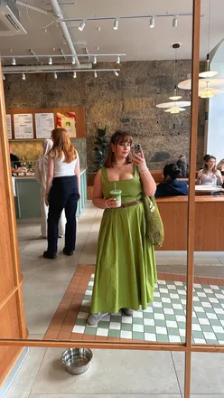 Midsize fashion blogger in a size 16 ASOS dress, enjoying matcha from Blank Street in Edinburgh.