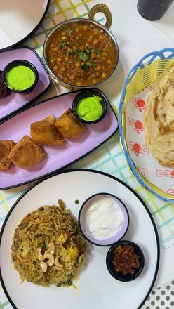Mushroom Paneer Biriyani, Channa Masala, Veg Samosas, Onion Bhajis, Malabar Porotta at Rithul Fusion Lounge, Sheffield.