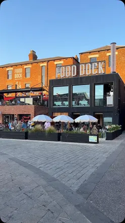 Canapรฉs featuring seasonal dishes and homemade gin at Roots and Seeds Cafe in Gloucester's food dock.
