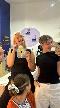 A creative workshop in Leeds featuring drinks and sewing, capturing a magical Cinderella moment.