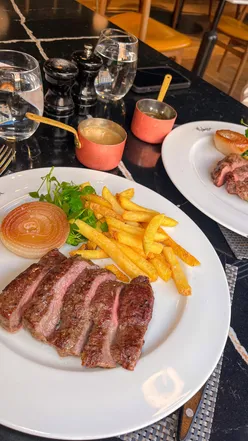 Bottomless brunch at Malmaison York with steak, chicken, and unlimited drinks like Prosecco and mimosas.