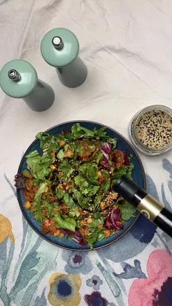 Vibrant salad with Florette mixed leaves, chickpeas, radishes, and balsamic drizzle, perfect for sunny days.