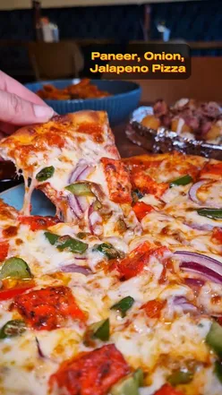 Delicious Italian and Indian dishes at Ravioli Leicester: bacon tots, paneer tikka, chilli chicken pasta, and pizza.