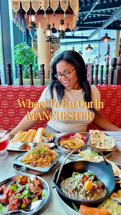 A vibrant spread of Indo-Chinese dishes and South Indian street food at Indian Tiffin Room, Manchester.