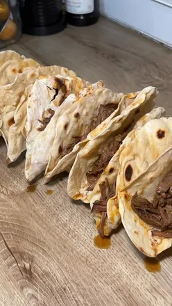 Homemade beef tacos with fresh, made-from-scratch tortillas for Taco Tuesday celebration.