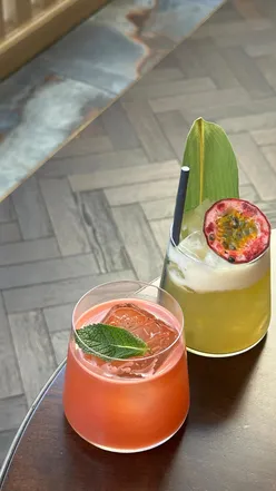 Cheers with cocktails at The Cut and Craft, perfect for Leeds foodies enjoying a school night out.