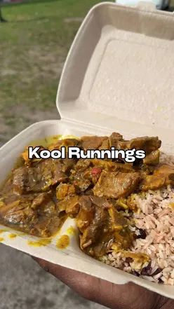 Delicious curry goat with rice and peas at Kool Runnings, a must-try Caribbean eatery in Manchester.