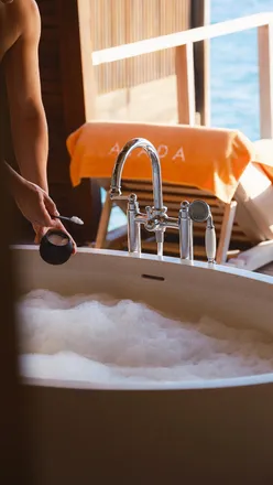 Luxurious bathtub with ocean view in a Maldives villa, perfect for a dreamy soak and tropical escape.