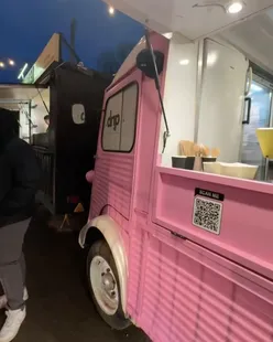Delicious artisan cakes and iced coffee at Drip Birmingham's drive-thru, perfect for a bank holiday treat.
