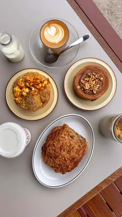 Delicious pastries from Milk Run, including popcorn diplomat and chocolate praline pastry, perfect for brunch.