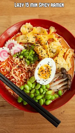 Quick spicy ramen with homemade scallop wontons, mushrooms, and egg, perfect for a 15-minute meal.