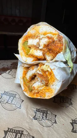 Delicious packed subs from Sub 126 at Max's Bar in Glasgow, featuring weekly specials and tasty sides.