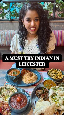 Delicious Indian-style dishes at Tamatanga, featuring curries, naan, and 2-4-1 cocktails in a vibrant atmosphere.
