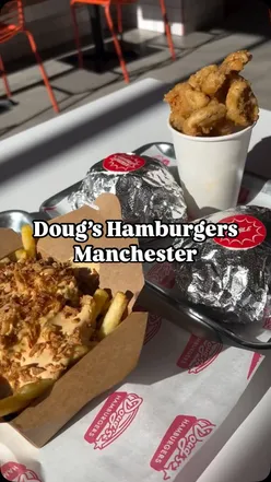 Delicious spread at Doug's Hamburgers: Double Royale Burger, Buffalo Chicken Sandwich, loaded fries, and a martini.