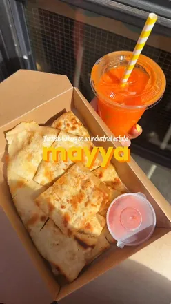 Freshly baked Turkish gozleme, cardamom bun, and Basque cheesecake at Mayya Bakery in Salford.