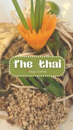 Delicious Thai dishes at The Thai in Glasgow, featuring chicken satay, pad Thai, and Laab Gai salad.
